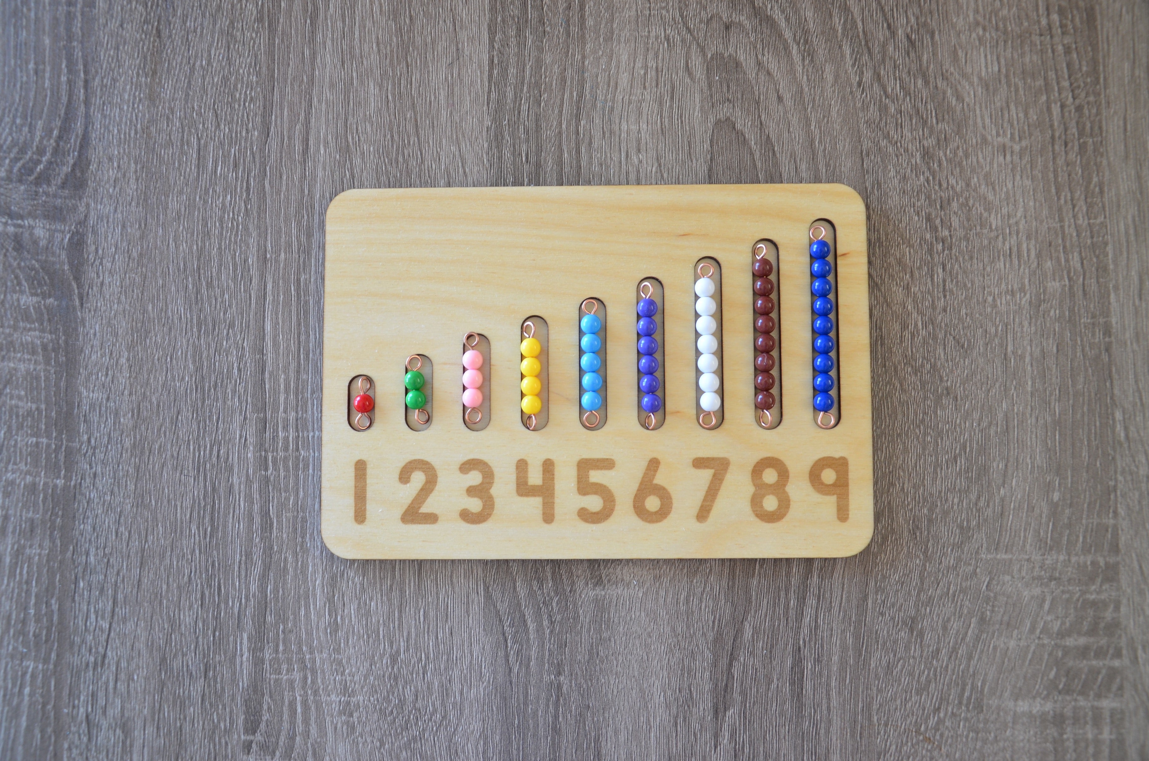 Montessori learning numbers 1-9 bead bars and number board