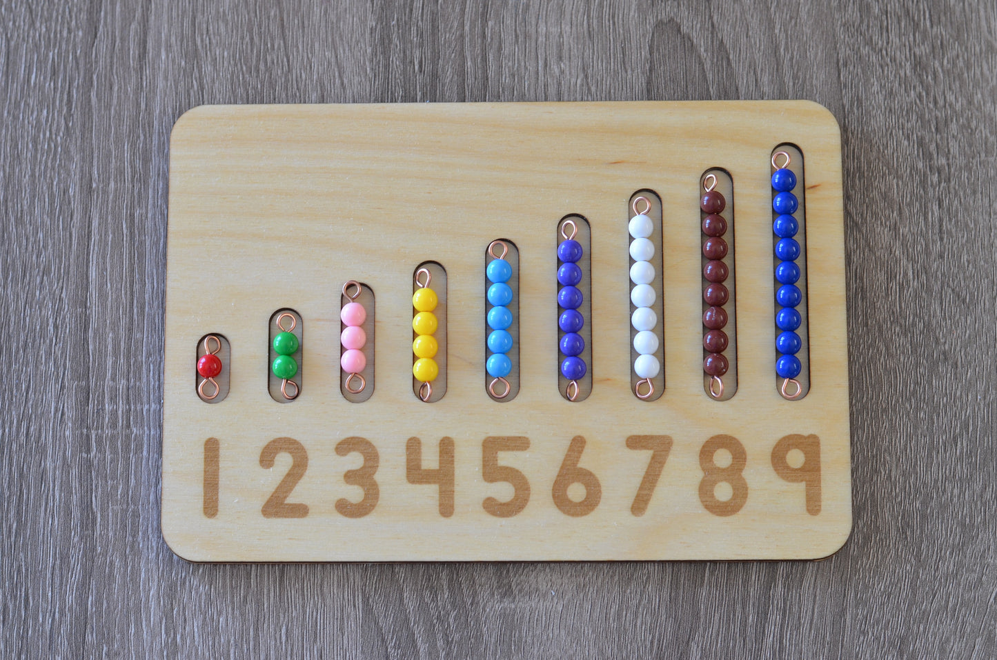 Montessori learning numbers 1-9 bead bars and number board